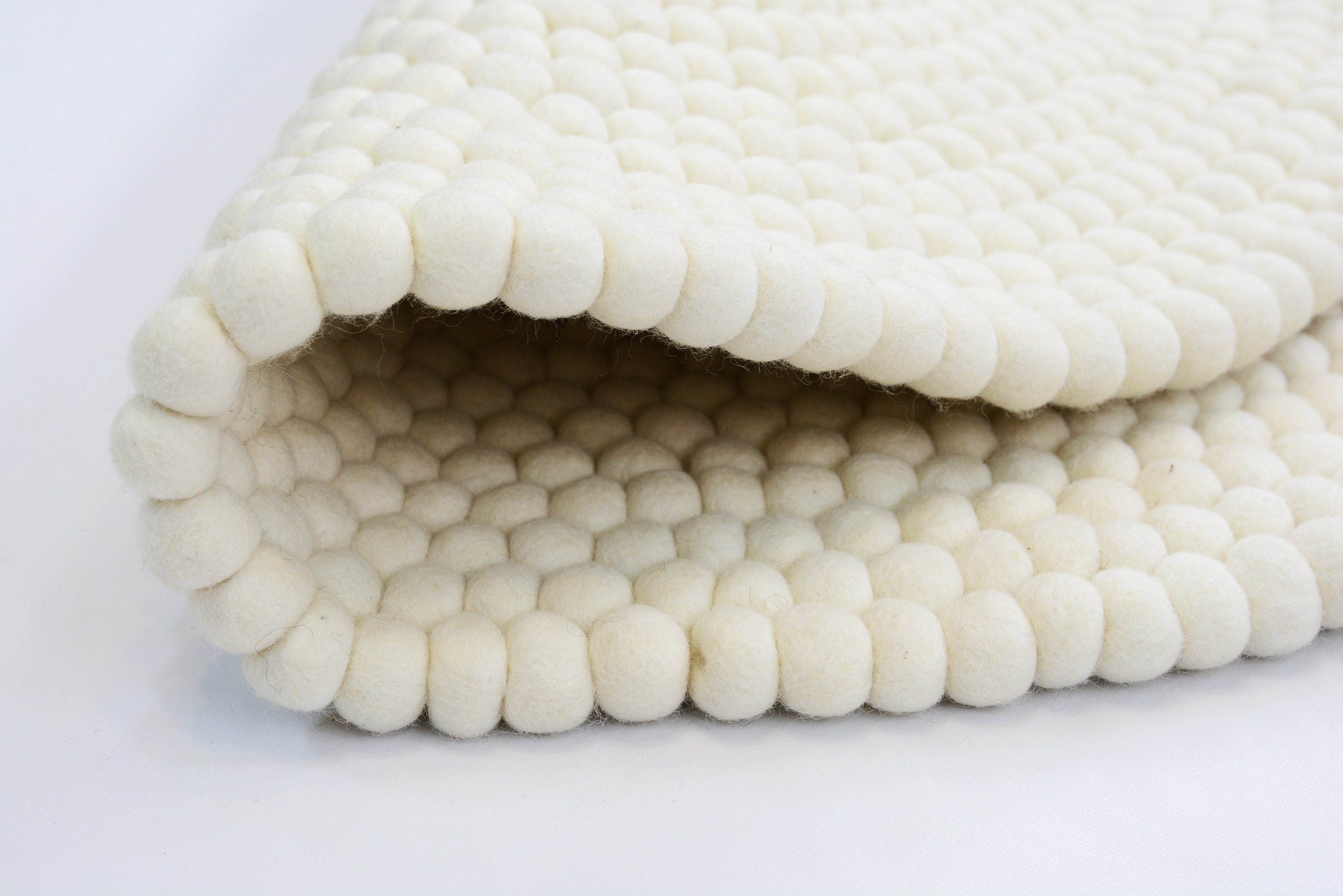 Handmade Pearl White Felt Ball Rug: Round Wool Nursery Rug